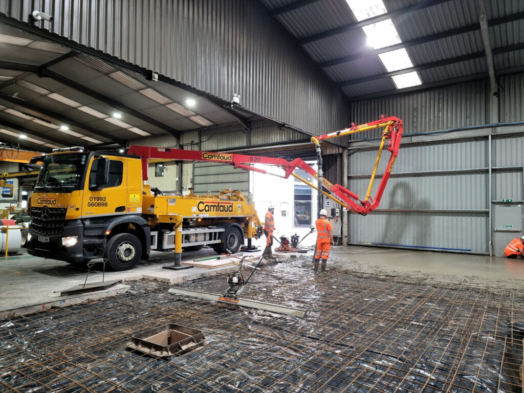 Schwing M20 Concrete Pump used to replace concrete factory floor